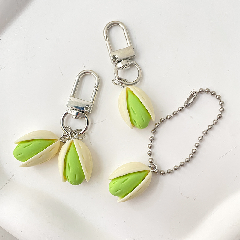 Pistache sleutelhanger creatie - Food Zinc recensie en prijs